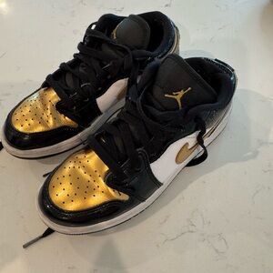 Kids Gold and Black Jordan 4Y